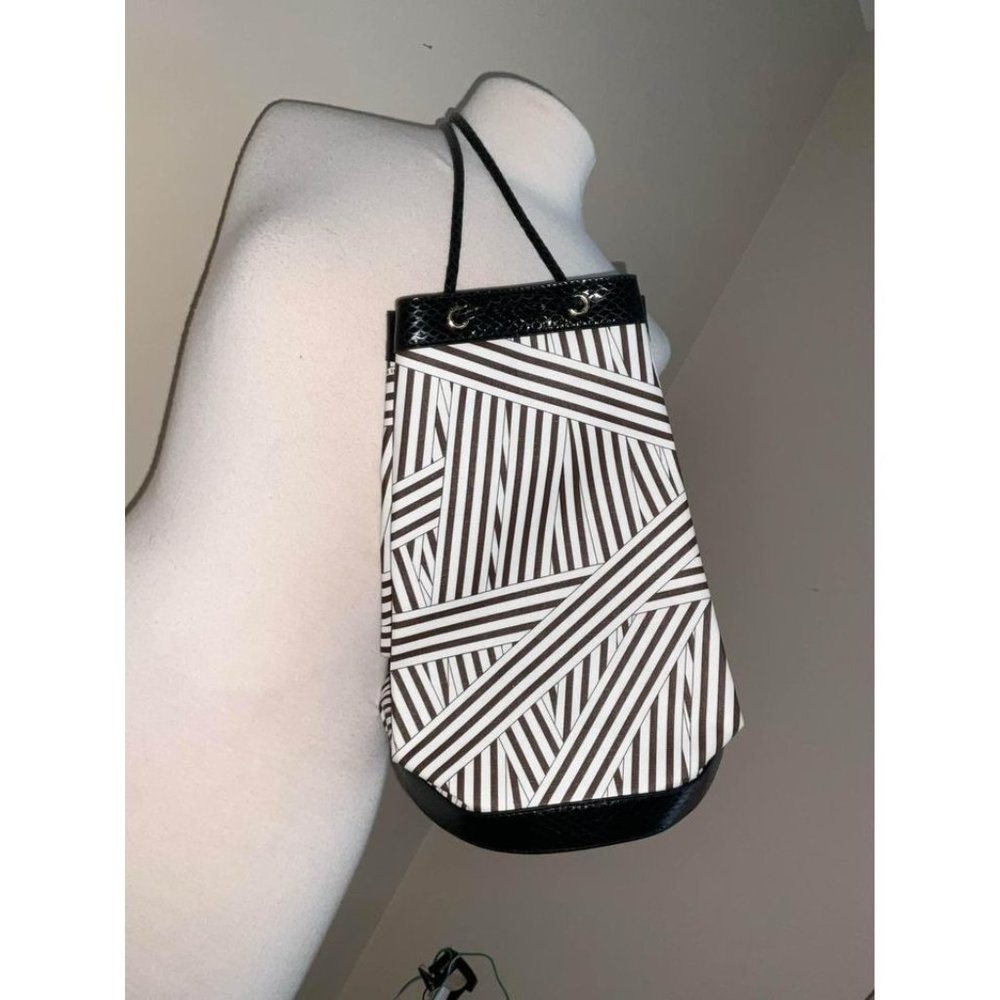 Henri Bendel Disturbed stripe Sling bag backpack New with tags